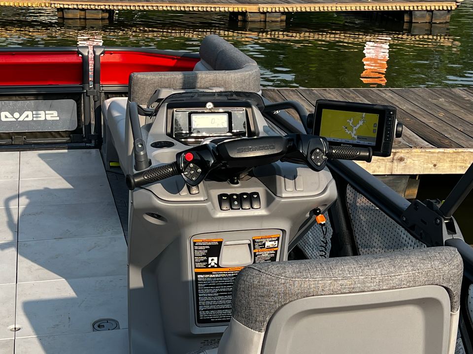 Sea-Doo Switch helm with its touchscreen GPS display, beside the dock