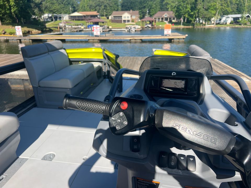Helm of the yellow Sea-Doo Switch with its touchscreen display and handlebar steering